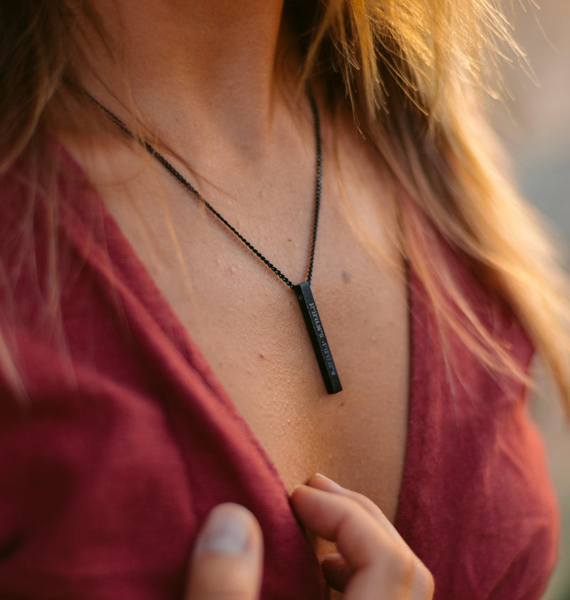 Black and red stone in lotus pendant by Binni's Wardrobe | The Secret Label