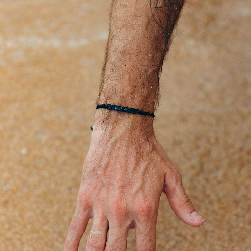 Black thread bracelet with black bar
